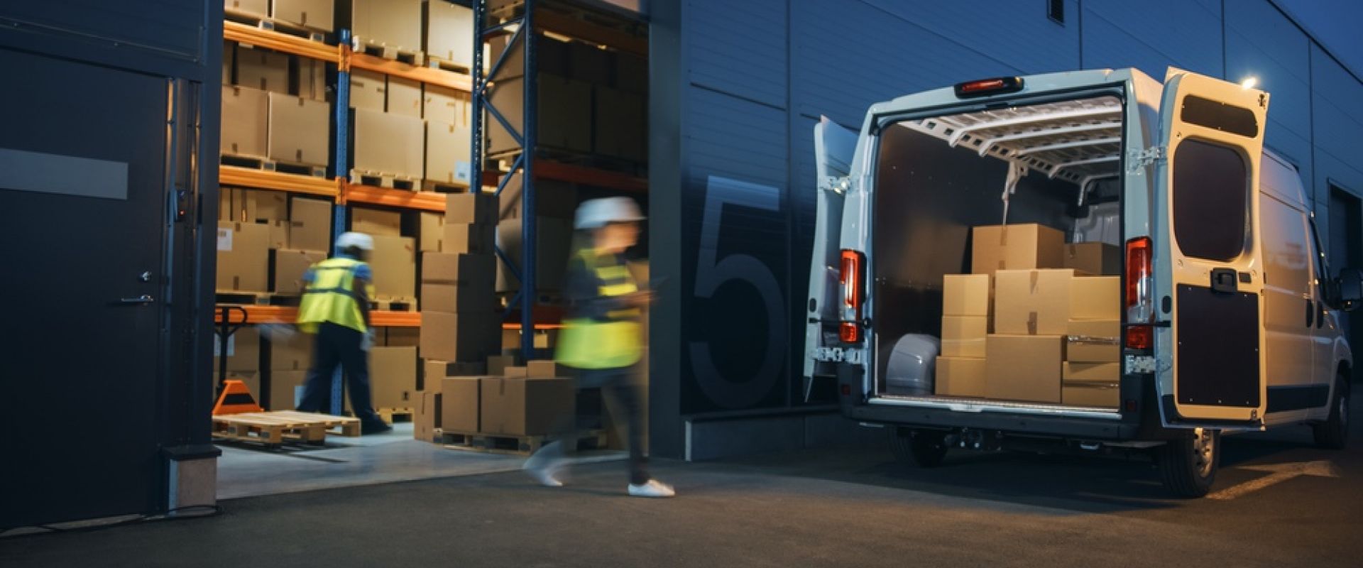 Outside of Logistics Distributions Warehouse Diverse Team of Workers Loading Delivery Truck with Cardboard Boxes. Online Orders, Purchases, E-Commerce Goods, Supply Chain