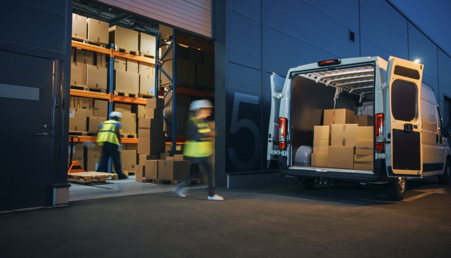 Outside of Logistics Distributions Warehouse Diverse Team of Workers Loading Delivery Truck with Cardboard Boxes. Online Orders, Purchases, E-Commerce Goods, Supply Chain